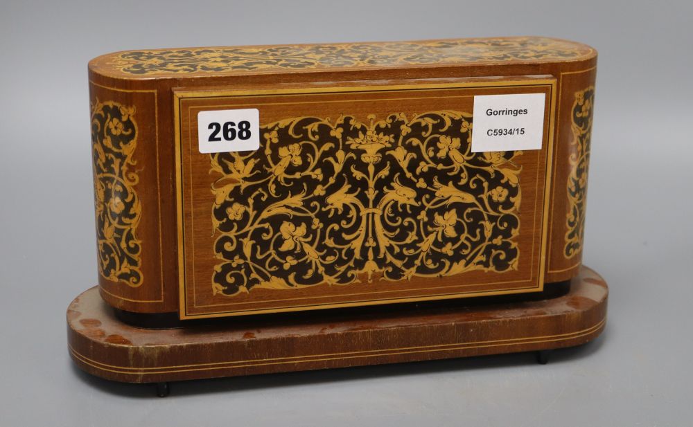 A Sorrento ware music box, length 32cm